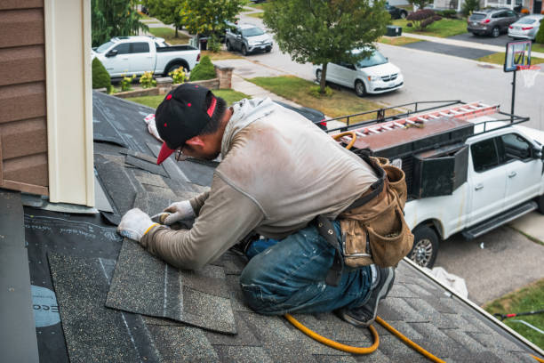Professional Roofing technician working in Corfu, NY